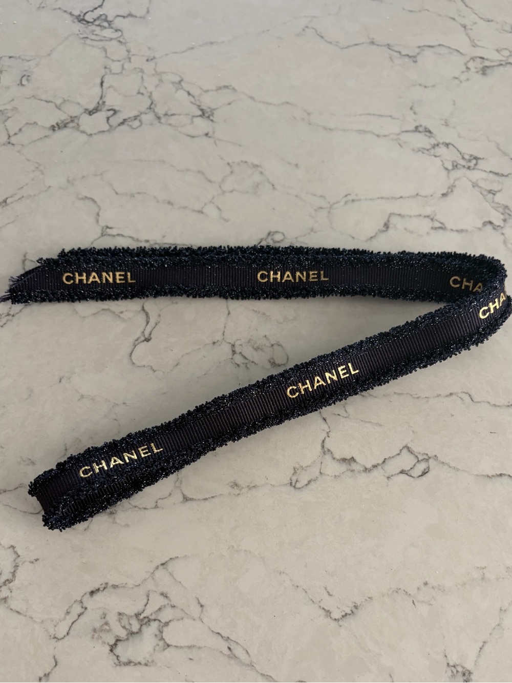 CHANEL Navy x Gold Logo Ribbon Accessory